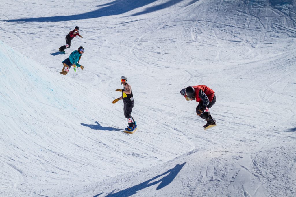 Riders (from left to right) Aaron Lebowitz, Jennifer Williams, Keaton Britt, and Josh Wolfman flying through a party lap.